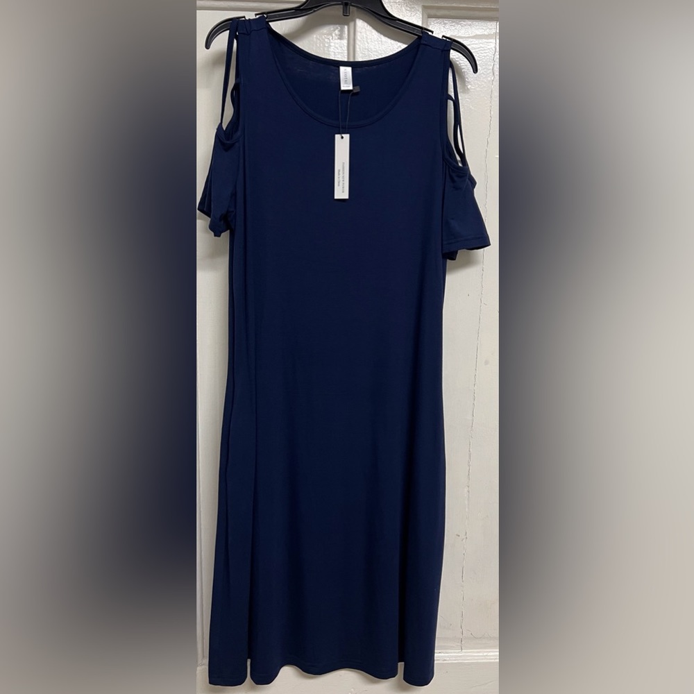 New with tag. Never worn. Size Medium